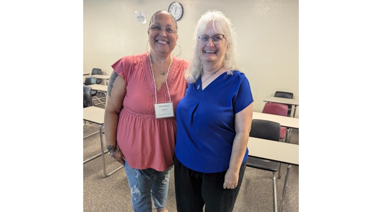 Sabrina Rawson and Michelle Jolly at conference